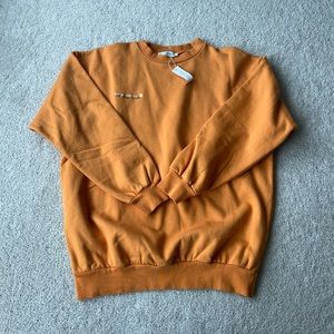Heavy Manners pumpkin crewneck